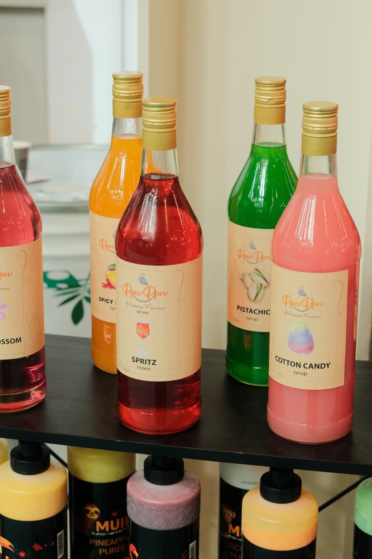 Frou Frou syrups and MUII purées displayed at HORECA 2026
